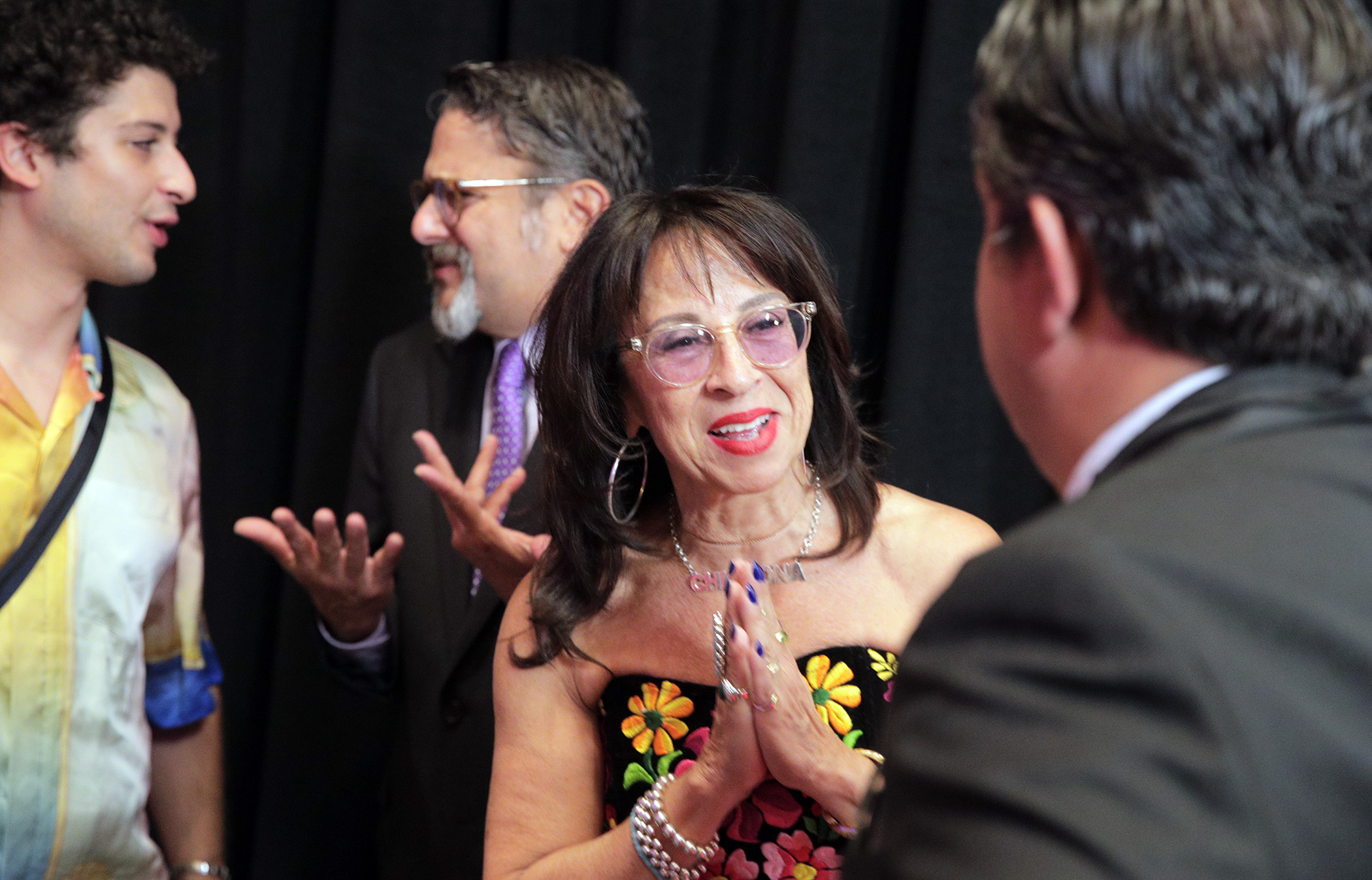 Maria Hinojosa chats with a guest at the National Association of Hispanic Journalists Hall of Fame Gala in Las Vegas, Nev., on Saturday, August 5, 2022.