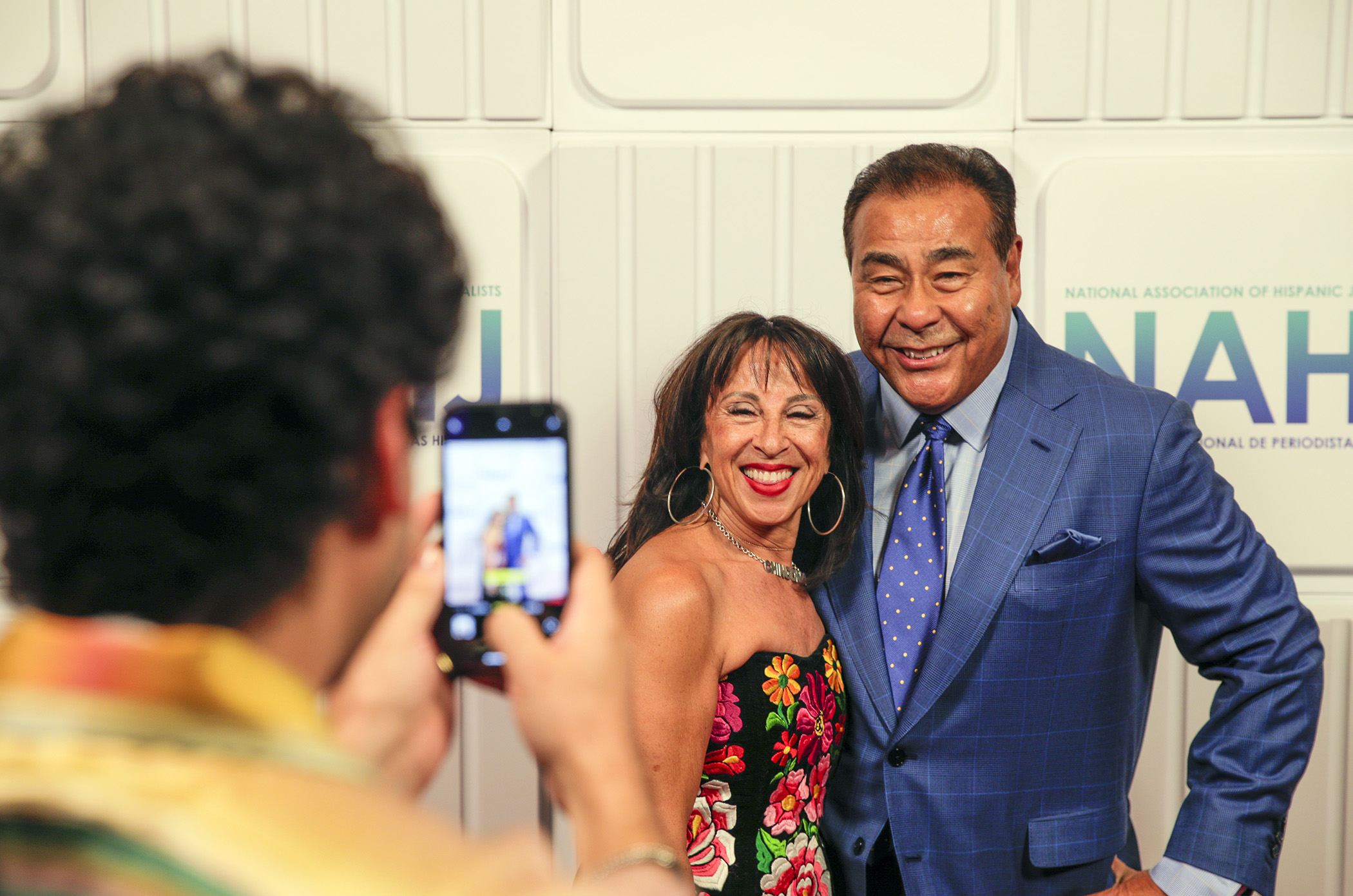 Maria Hinojosa and John Quiñones pose for a photo on the National Association of Hispanic Journalists Hall of Fame Gala red carpet in Las Vegas, Nev., on Saturday, August 5, 2022.