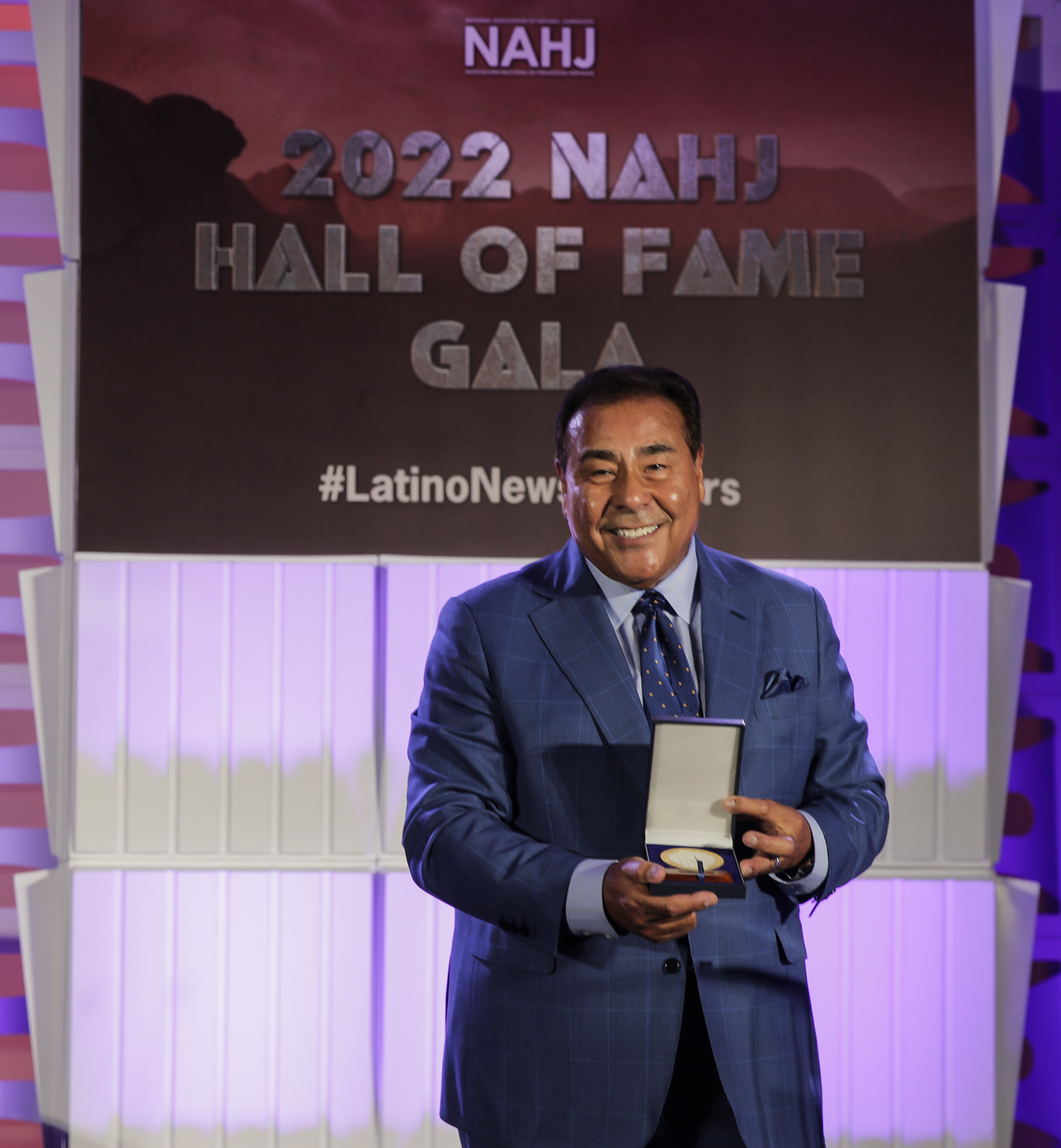 John Quiñones holds his National Association of Hispanic Journalists President's Award at the Hall of Fame Gala in Las Vegas, Nev., on Saturday, August 6, 2022.