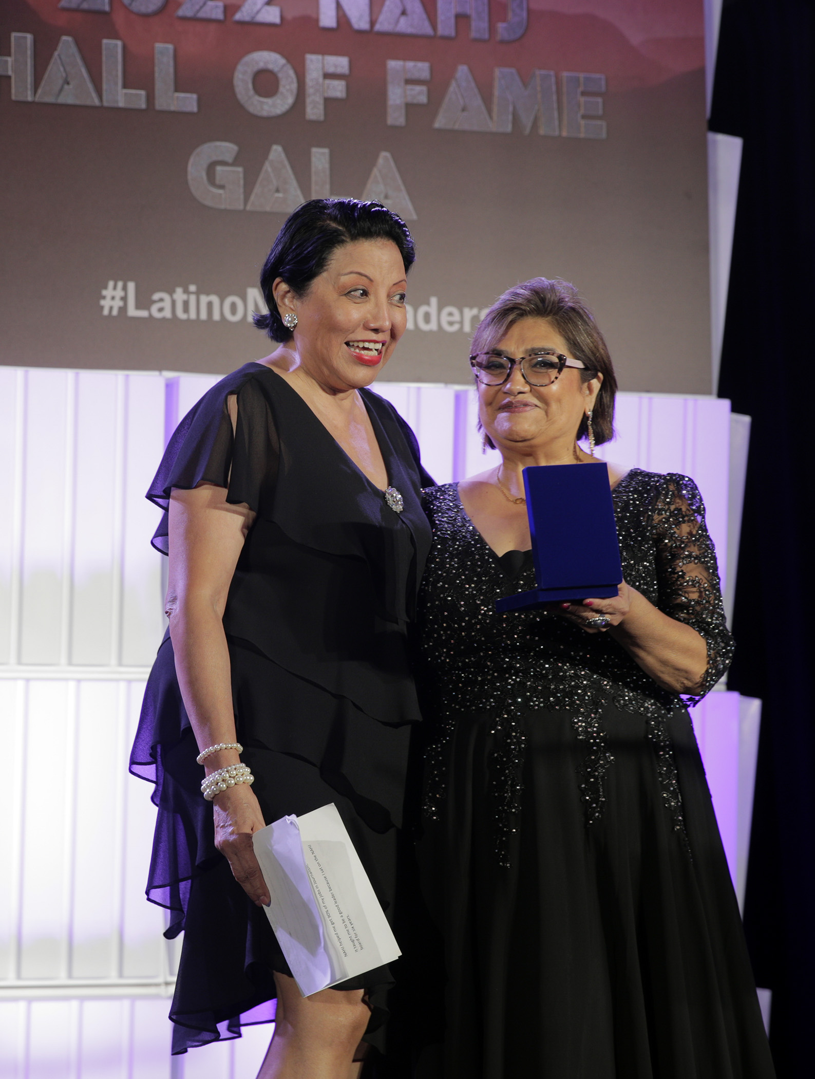 Rebecca Aguilar receives her Hall of Fame induction medal from President Nora López at the 2022 NAHJ Hall of Fame Gala in Las Vegas, Nev., on Saturday, August 5, 2022.